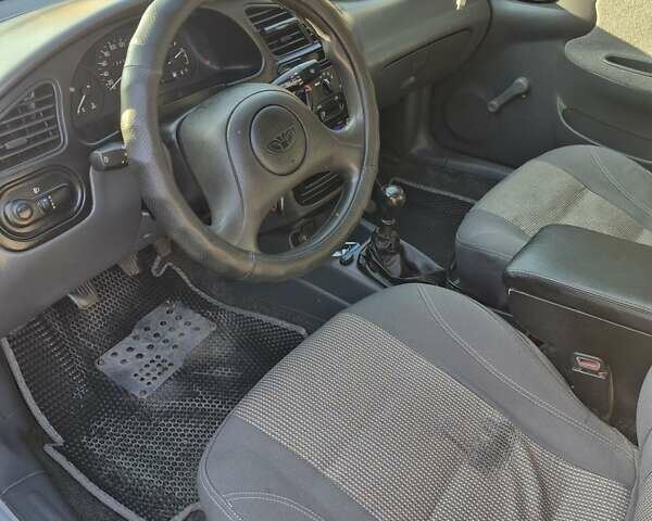 Серый Дэу Ланос, объемом двигателя 1.39 л и пробегом 135 тыс. км за 2800 $, фото 4 на Automoto.ua