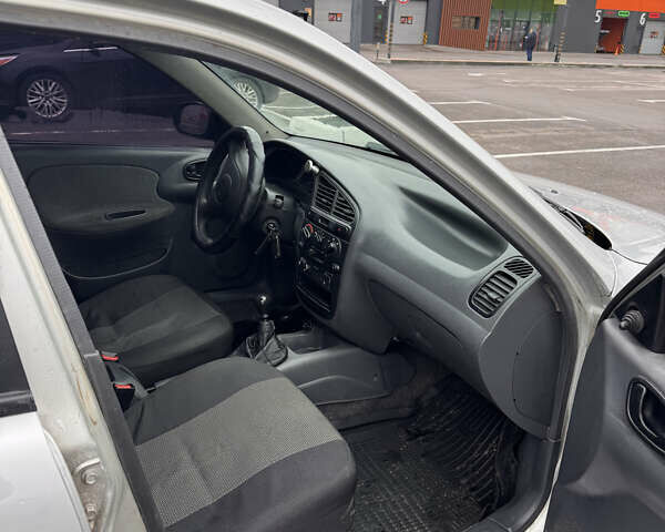 Сірий Деу Ланос, об'ємом двигуна 1.39 л та пробігом 314 тис. км за 1500 $, фото 8 на Automoto.ua