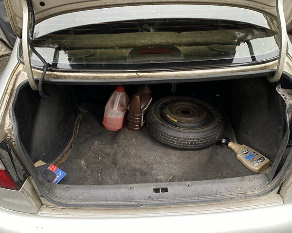 Сірий Деу Ланос, об'ємом двигуна 1.5 л та пробігом 241 тис. км за 1500 $, фото 6 на Automoto.ua