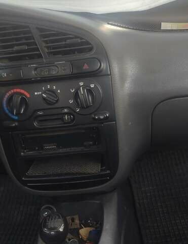 Сірий Деу Ланос, об'ємом двигуна 1.5 л та пробігом 179 тис. км за 2300 $, фото 5 на Automoto.ua