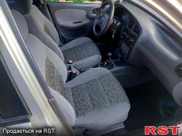 Серый Дэу Ланос, объемом двигателя 1.5 л и пробегом 167 тыс. км за 2950 $, фото 6 на Automoto.ua