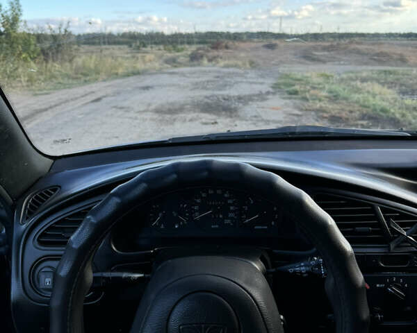Серый Дэу Ланос, объемом двигателя 1.5 л и пробегом 290 тыс. км за 3000 $, фото 9 на Automoto.ua