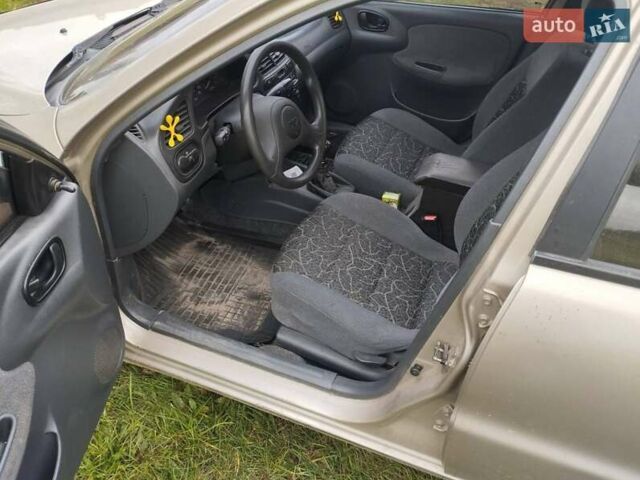 Дэу Ланос 2007 в Сарнах на Automoto.ua Серый Дэу Ланос, объемом двигателя 1.5 л и пробегом 180 тыс. км за 1550 $, фото 5 на Automoto.ua