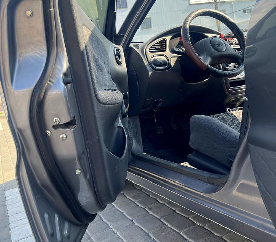 Сірий Деу Ланос, об'ємом двигуна 1.5 л та пробігом 154 тис. км за 2500 $, фото 6 на Automoto.ua