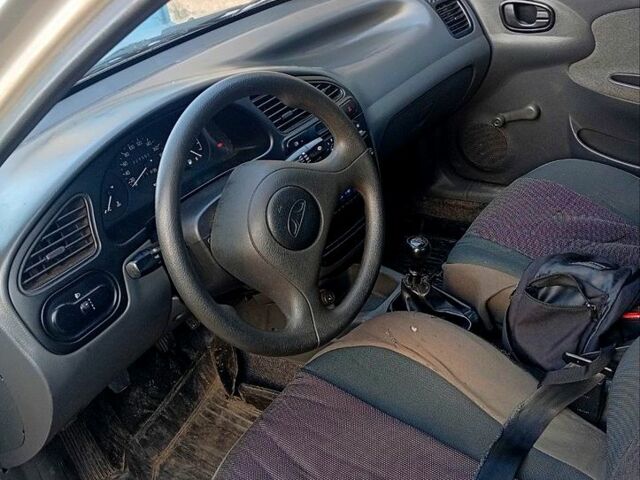 Сірий Деу Ланос, об'ємом двигуна 1.4 л та пробігом 230 тис. км за 1900 $, фото 3 на Automoto.ua