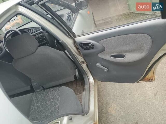 Серый Дэу Ланос, объемом двигателя 1.6 л и пробегом 234 тыс. км за 1699 $, фото 6 на Automoto.ua