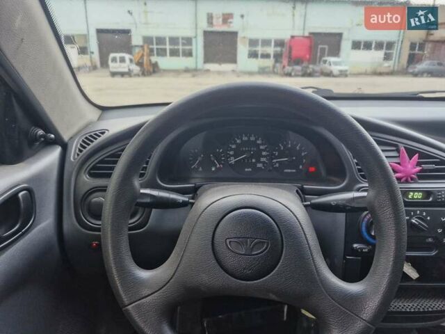 Сірий Деу Ланос, об'ємом двигуна 1.5 л та пробігом 200 тис. км за 1750 $, фото 9 на Automoto.ua