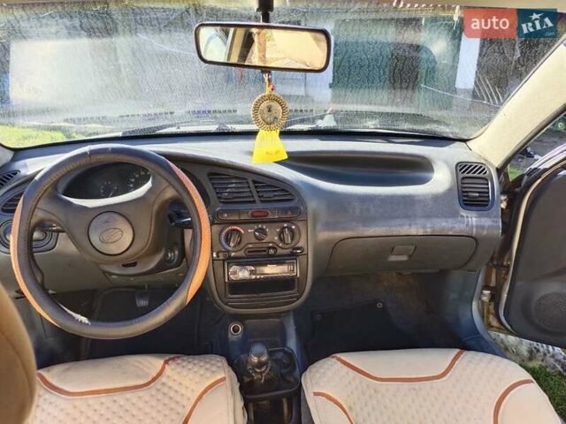 Серый Дэу Ланос, объемом двигателя 1.39 л и пробегом 330 тыс. км за 1200 $, фото 2 на Automoto.ua