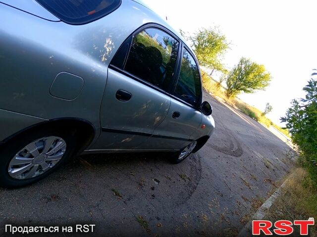 Сірий Деу Ланос, об'ємом двигуна 1.5 л та пробігом 253 тис. км за 1950 $, фото 3 на Automoto.ua