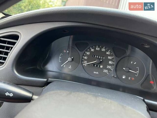 Сірий Деу Ланос, об'ємом двигуна 1.39 л та пробігом 137 тис. км за 2800 $, фото 11 на Automoto.ua