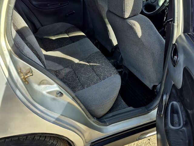 Серый Дэу Ланос, объемом двигателя 1.5 л и пробегом 220 тыс. км за 1500 $, фото 3 на Automoto.ua