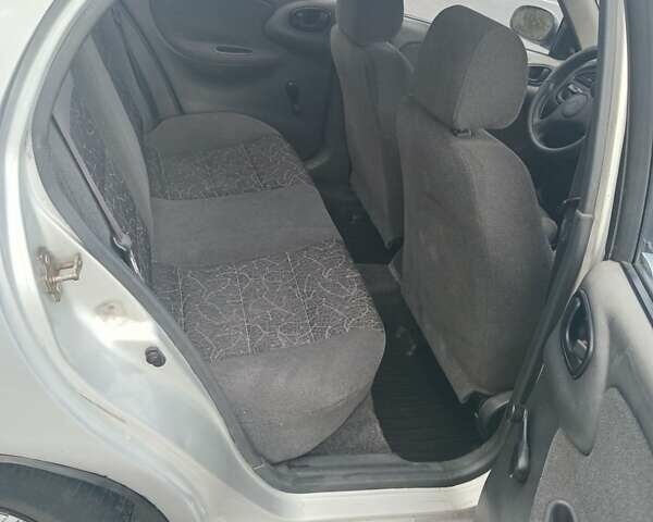 Серый Дэу Ланос, объемом двигателя 1.5 л и пробегом 225 тыс. км за 2400 $, фото 10 на Automoto.ua