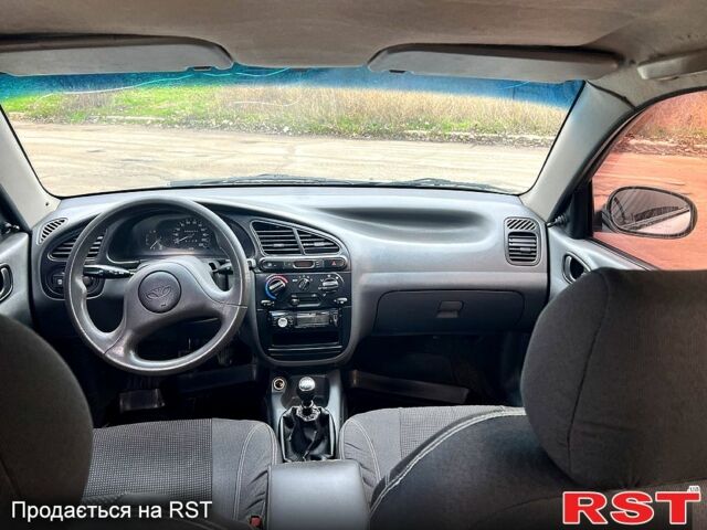 Серый Дэу Ланос, объемом двигателя 1.5 л и пробегом 221 тыс. км за 2450 $, фото 4 на Automoto.ua