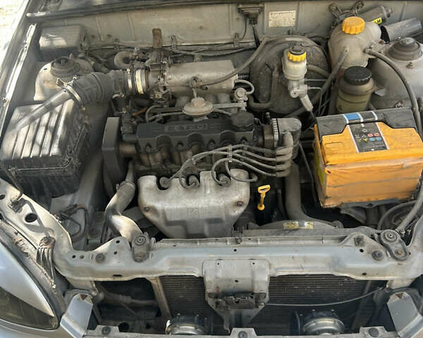 Сірий Деу Ланос, об'ємом двигуна 1.5 л та пробігом 290 тис. км за 2000 $, фото 6 на Automoto.ua