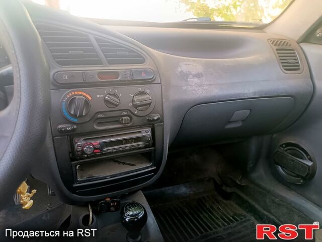 Серый Дэу Ланос, объемом двигателя 1.5 л и пробегом 200 тыс. км за 1150 $, фото 5 на Automoto.ua