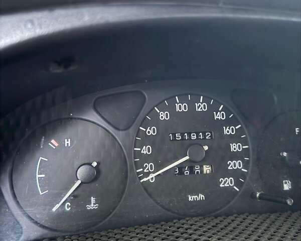 Серый Дэу Ланос, объемом двигателя 1.39 л и пробегом 151 тыс. км за 1500 $, фото 1 на Automoto.ua