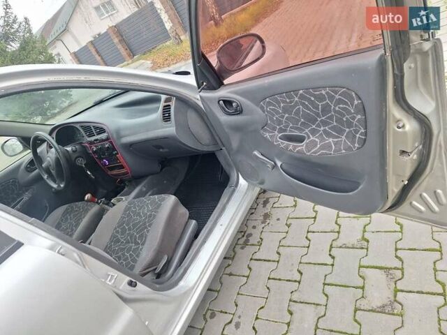 Сірий Деу Ланос, об'ємом двигуна 1.3 л та пробігом 111 тис. км за 1100 $, фото 21 на Automoto.ua