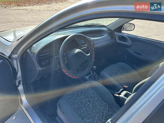 Серый Дэу Ланос, объемом двигателя 1.5 л и пробегом 199 тыс. км за 1800 $, фото 25 на Automoto.ua