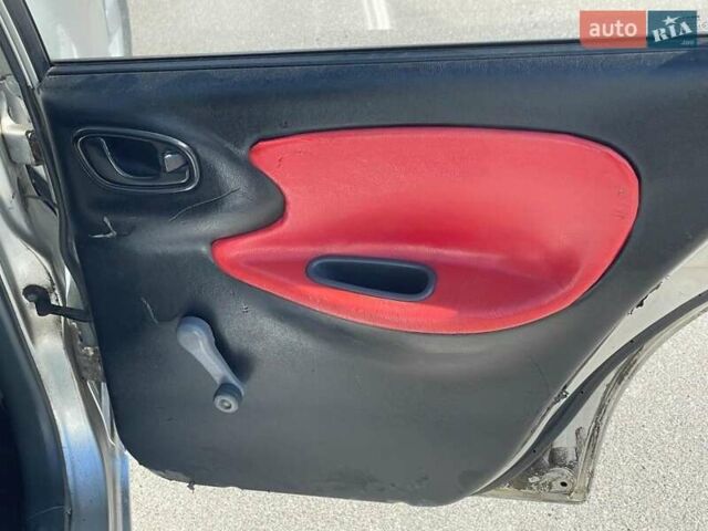 Серый Дэу Ланос, объемом двигателя 1.5 л и пробегом 290 тыс. км за 2500 $, фото 39 на Automoto.ua