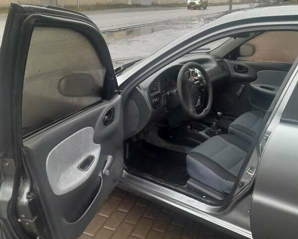 Серый Дэу Ланос, объемом двигателя 1.5 л и пробегом 235 тыс. км за 1950 $, фото 6 на Automoto.ua