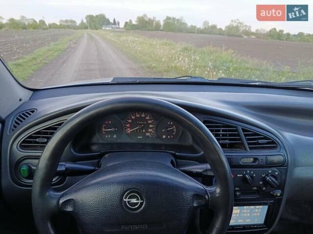Сірий Деу Ланос, об'ємом двигуна 1.39 л та пробігом 175 тис. км за 2500 $, фото 3 на Automoto.ua