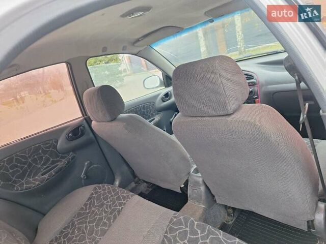 Сірий Деу Ланос, об'ємом двигуна 1.3 л та пробігом 111 тис. км за 1100 $, фото 20 на Automoto.ua