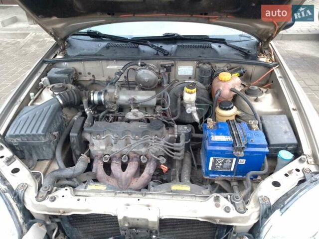 Дэу Ланос 2007 в Сарнах на Automoto.ua Серый Дэу Ланос, объемом двигателя 1.5 л и пробегом 180 тыс. км за 1550 $, фото 6 на Automoto.ua