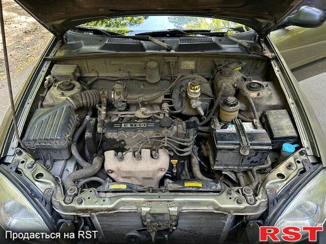 Серый Дэу Ланос, объемом двигателя 1.5 л и пробегом 229 тыс. км за 2499 $, фото 6 на Automoto.ua