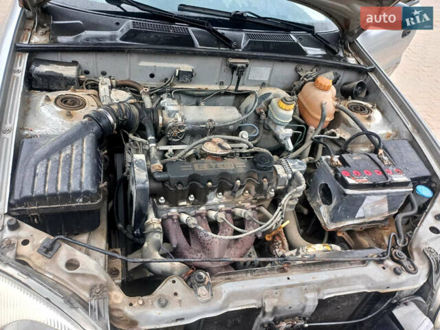 Серый Дэу Ланос, объемом двигателя 1.5 л и пробегом 357 тыс. км за 1100 $, фото 13 на Automoto.ua