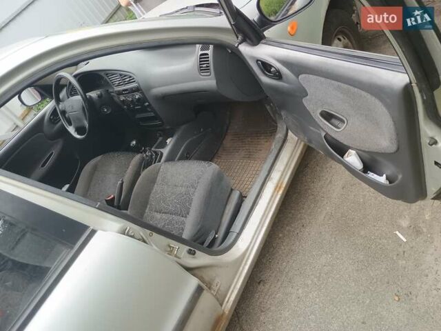 Серый Дэу Ланос, объемом двигателя 1.6 л и пробегом 234 тыс. км за 1699 $, фото 7 на Automoto.ua