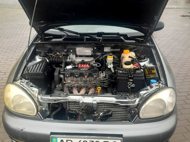 Серый Дэу Ланос, объемом двигателя 1.5 л и пробегом 237 тыс. км за 1950 $, фото 4 на Automoto.ua