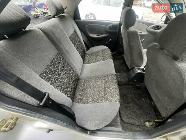 Серый Дэу Ланос, объемом двигателя 1.5 л и пробегом 200 тыс. км за 1950 $, фото 9 на Automoto.ua