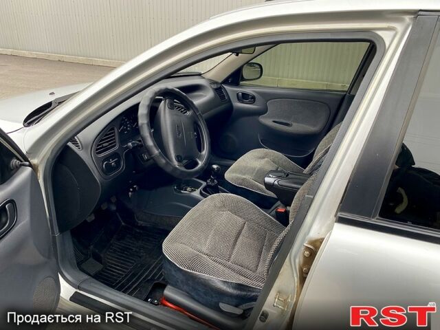 Серый Дэу Ланос, объемом двигателя 1.6 л и пробегом 150 тыс. км за 3160 $, фото 11 на Automoto.ua