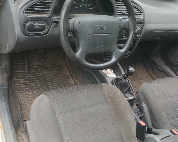 Серый Дэу Ланос, объемом двигателя 1.6 л и пробегом 234 тыс. км за 1699 $, фото 10 на Automoto.ua