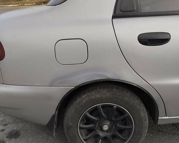 Серый Дэу Ланос, объемом двигателя 1.5 л и пробегом 260 тыс. км за 2000 $, фото 3 на Automoto.ua