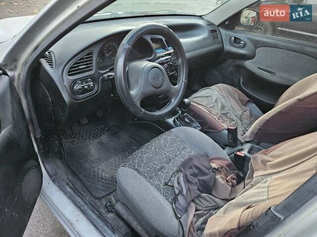 Серый Дэу Ланос, объемом двигателя 1.5 л и пробегом 290 тыс. км за 900 $, фото 3 на Automoto.ua