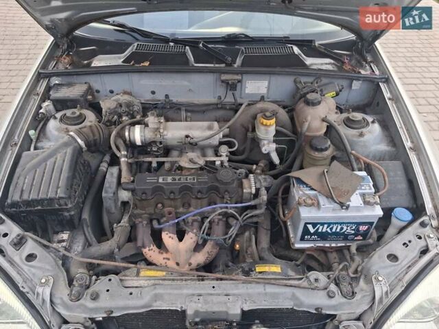 Серый Дэу Ланос, объемом двигателя 1.5 л и пробегом 270 тыс. км за 1500 $, фото 11 на Automoto.ua