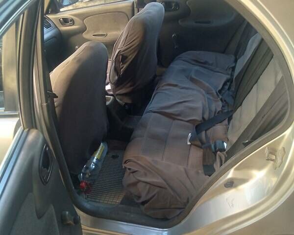 Сірий Деу Ланос, об'ємом двигуна 1.5 л та пробігом 252 тис. км за 1800 $, фото 3 на Automoto.ua