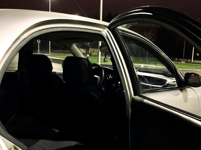 Сірий Деу Ланос, об'ємом двигуна 1.4 л та пробігом 198 тис. км за 1470 $, фото 4 на Automoto.ua