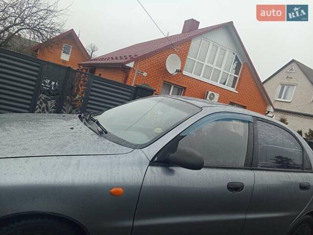 Серый Дэу Ланос, объемом двигателя 1.5 л и пробегом 250 тыс. км за 2100 $, фото 3 на Automoto.ua