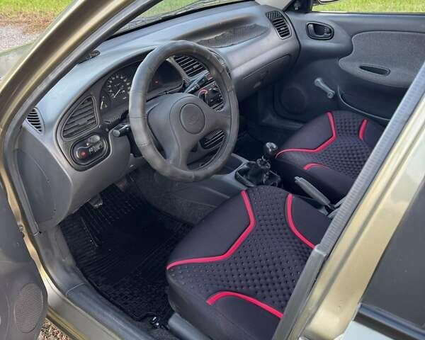 Серый Дэу Ланос, объемом двигателя 1.39 л и пробегом 151 тыс. км за 1500 $, фото 5 на Automoto.ua