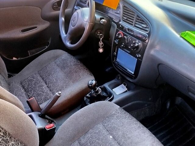 Серый Дэу Ланос, объемом двигателя 1.5 л и пробегом 240 тыс. км за 1800 $, фото 4 на Automoto.ua