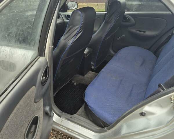 Серый Дэу Ланос, объемом двигателя 1.5 л и пробегом 242 тыс. км за 2100 $, фото 4 на Automoto.ua