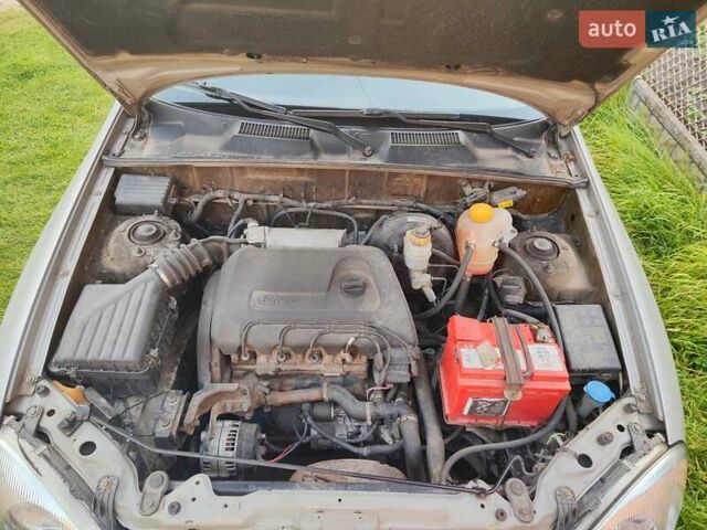 Серый Дэу Ланос, объемом двигателя 1.4 л и пробегом 239 тыс. км за 2100 $, фото 6 на Automoto.ua