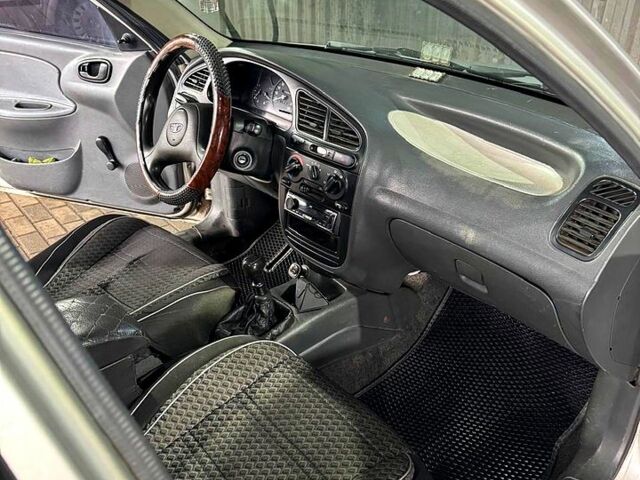 Серый Дэу Ланос, объемом двигателя 1.6 л и пробегом 160 тыс. км за 2600 $, фото 7 на Automoto.ua