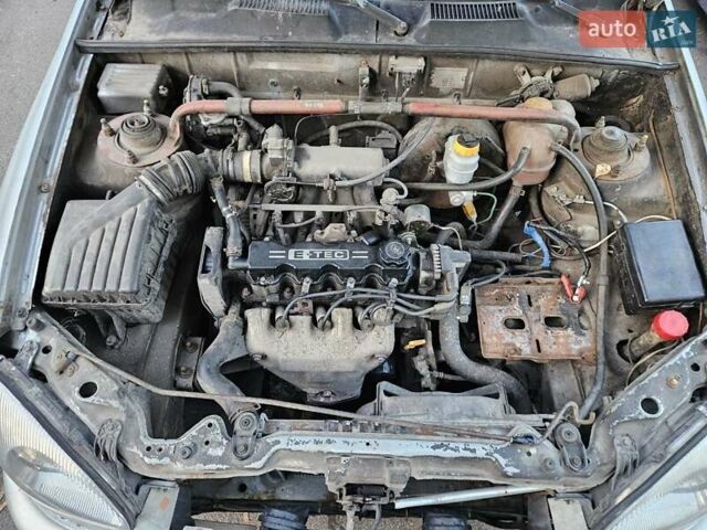 Серый Дэу Ланос, объемом двигателя 1.5 л и пробегом 290 тыс. км за 900 $, фото 4 на Automoto.ua