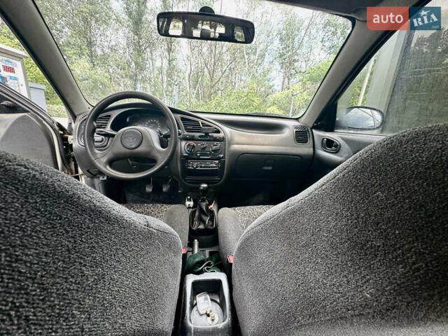 Сірий Деу Ланос, об'ємом двигуна 1.5 л та пробігом 89 тис. км за 2299 $, фото 4 на Automoto.ua