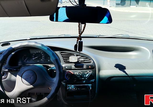 Серый Дэу Ланос, объемом двигателя 1.5 л и пробегом 221 тыс. км за 2600 $, фото 9 на Automoto.ua