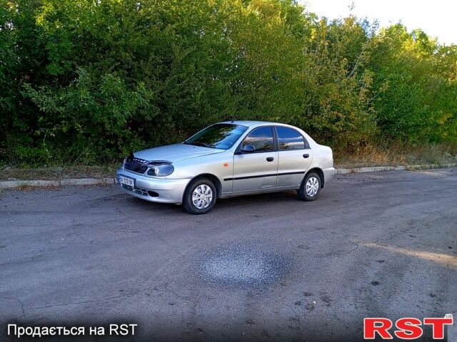 Сірий Деу Ланос, об'ємом двигуна 1.5 л та пробігом 253 тис. км за 1950 $, фото 1 на Automoto.ua