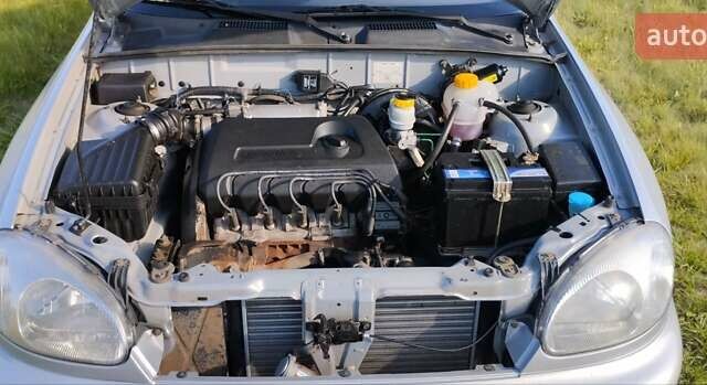 Серый Дэу Ланос, объемом двигателя 1.4 л и пробегом 225 тыс. км за 2700 $, фото 7 на Automoto.ua